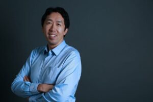 Andrew Ng, co-founder of Coursera and AI researcher, looking at the camera with a neutral smile.