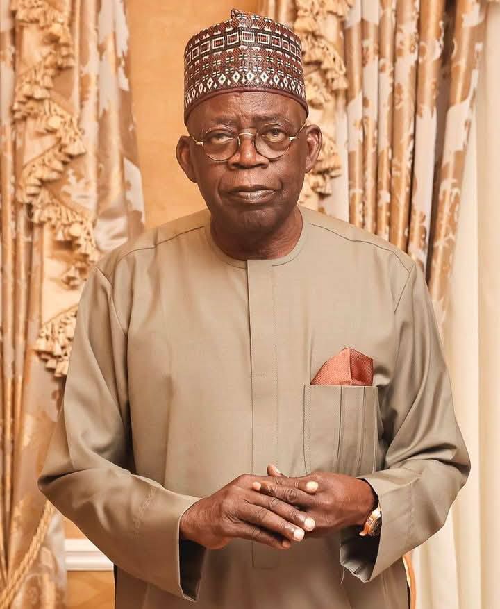 Bola Ahmed Tinubu, President of Nigeria, wearing traditional Nigerian attire and cap.