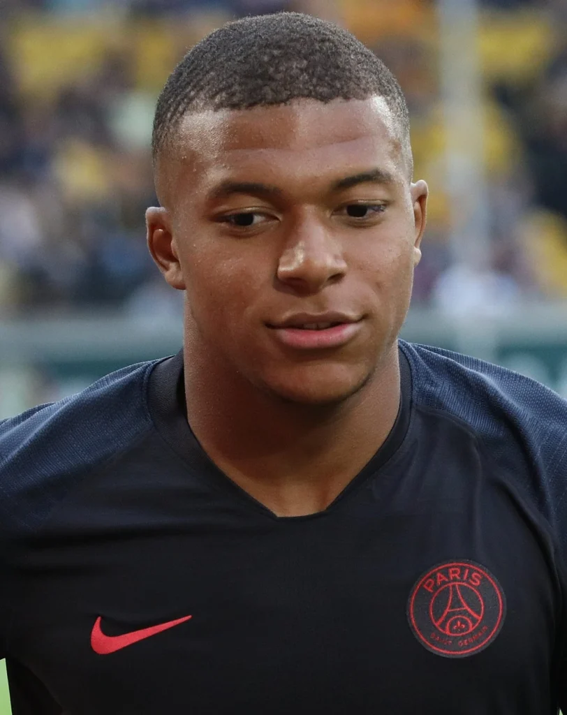 Close-up portrait of French soccer player Kylian Mbappé.