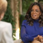 Oprah Winfrey wearing sunglasses and speaking during an interview.