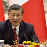 Xi Jinping delivering a speech at an official government event