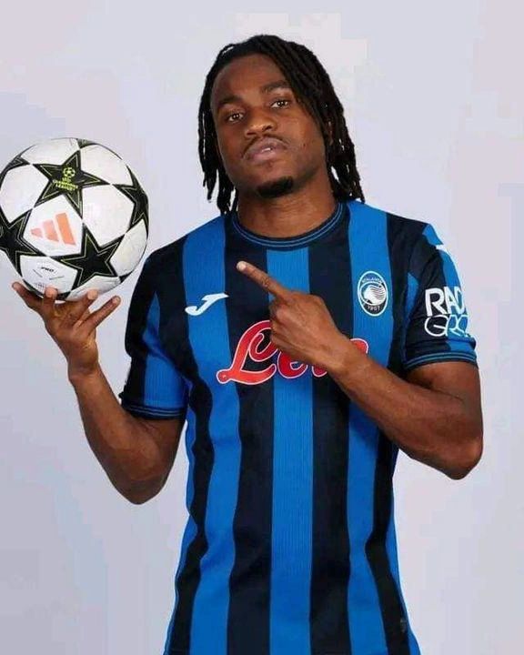 Portrait of Nigerian professional footballer Ademola Lookman in his team jersey.