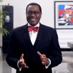 Professional photograph of Dr. Akinwumi Adesina, President of the African Development Bank, wearing his signature bowtie.