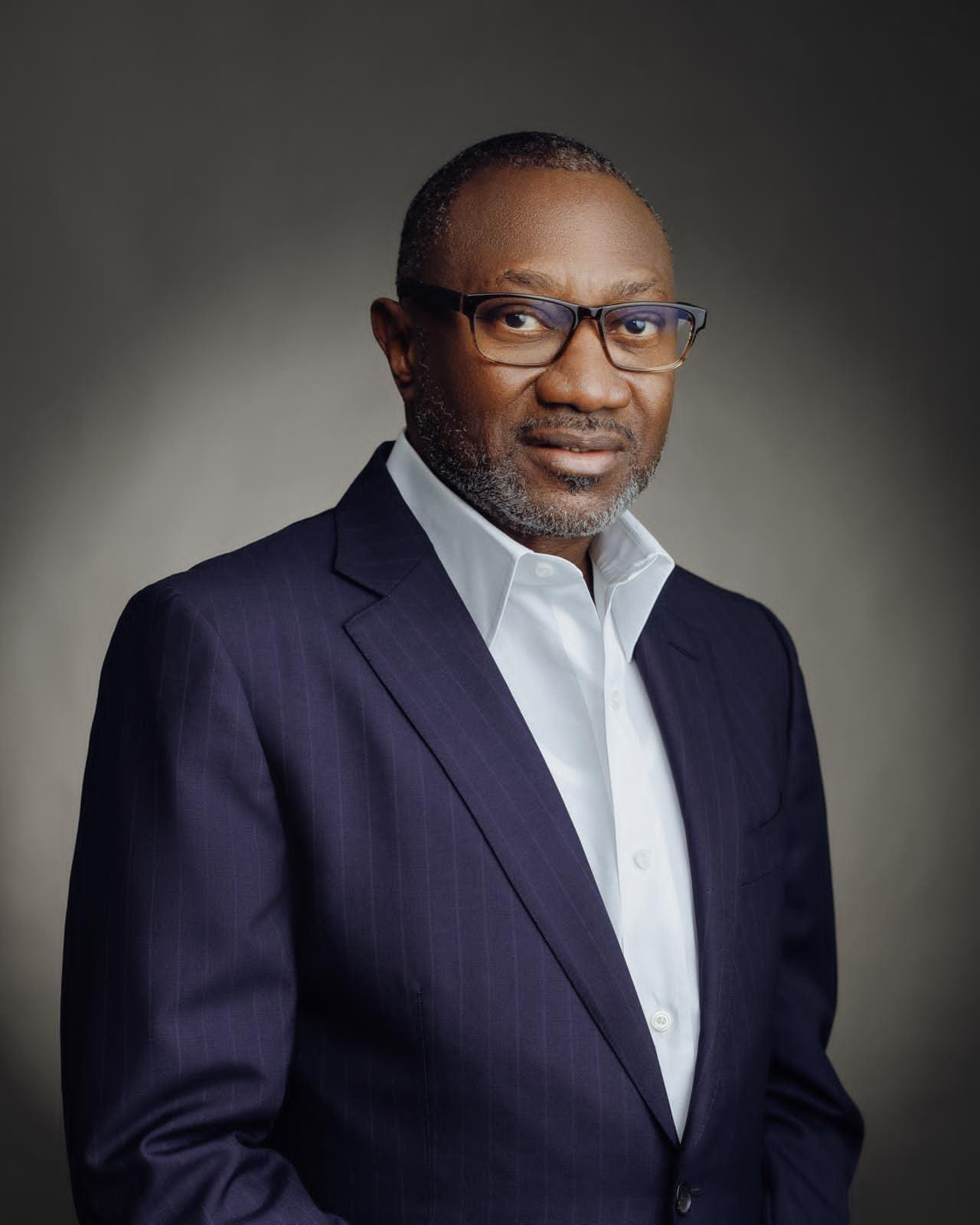 Headshot of Nigerian investor and philanthropist Femi Otedola smiling in modern attire.