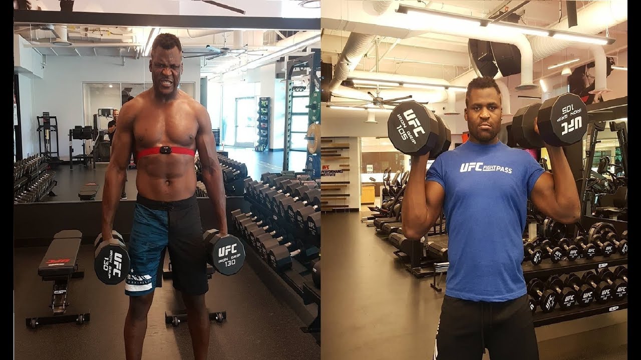 Cameroonian professional mixed martial artist and boxer Francis Ngannou posing in training gear.