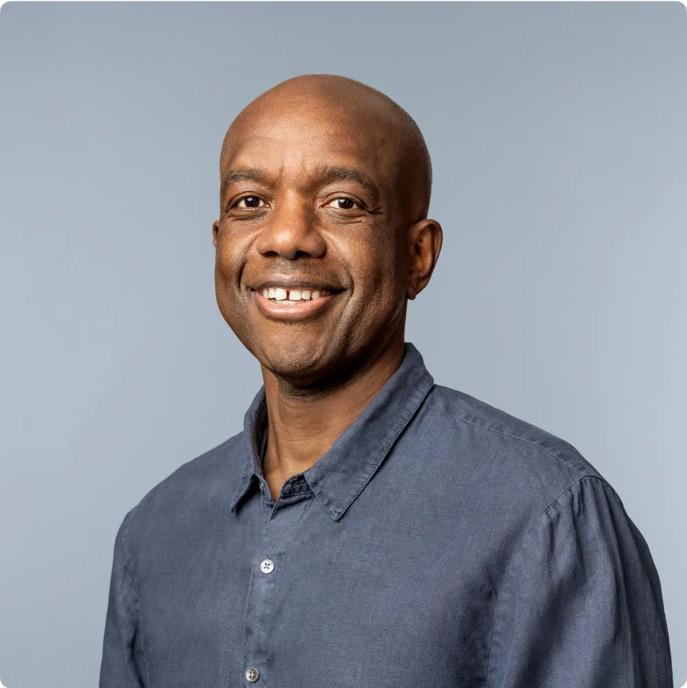 Professional portrait of Zimbabwean-American computer scientist and AI executive James Manyika.