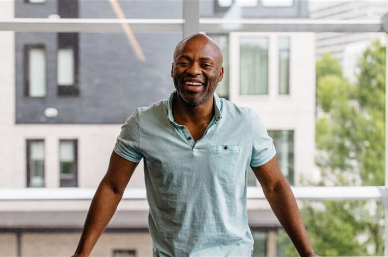 Professional headshot of Tope Awotona, founder and CEO of Calendly.