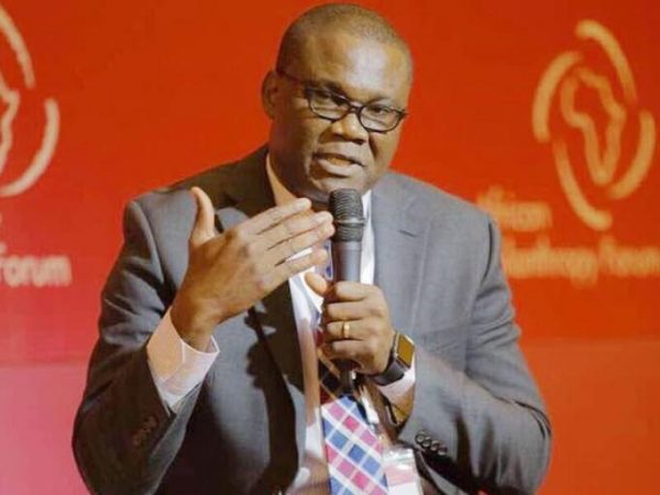 Studio photograph of Innocent Chukwuma, founder and chairman of Innoson Vehicle Manufacturing.